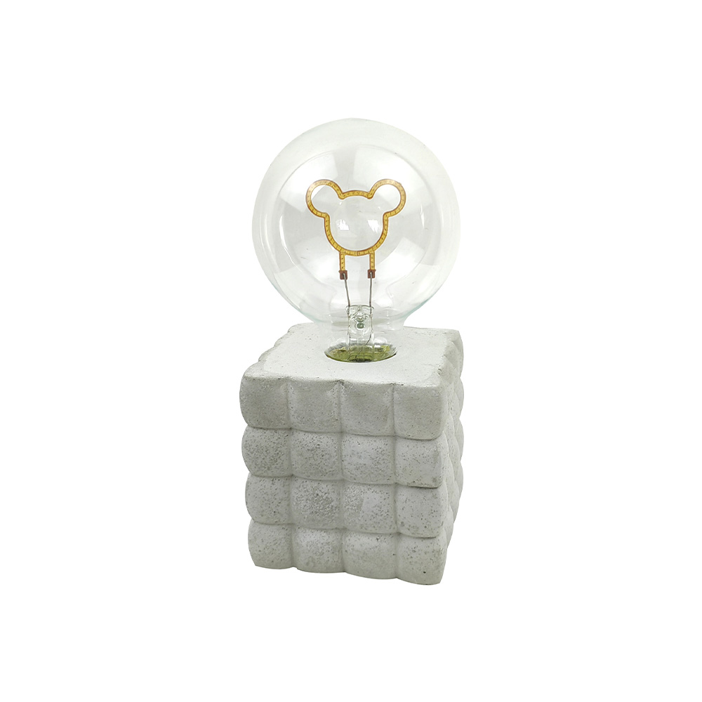 Lampada da scrivania glassata con testure in cemento